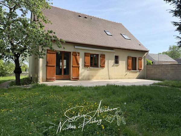 Maison individuelle avec garage et jardin arboré