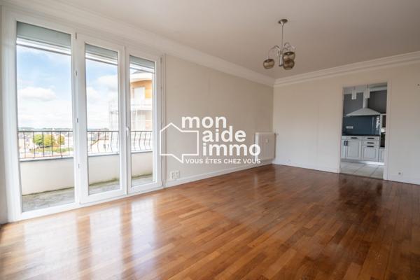 Appartement T3 avec balcons, cave et place de parking