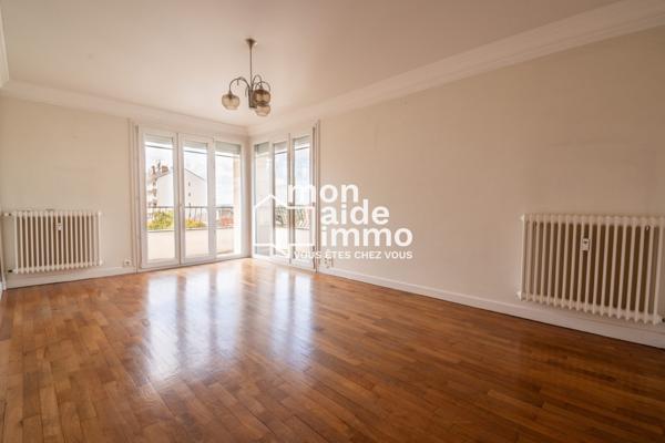 Appartement T3 avec balcons, cave et place de parking