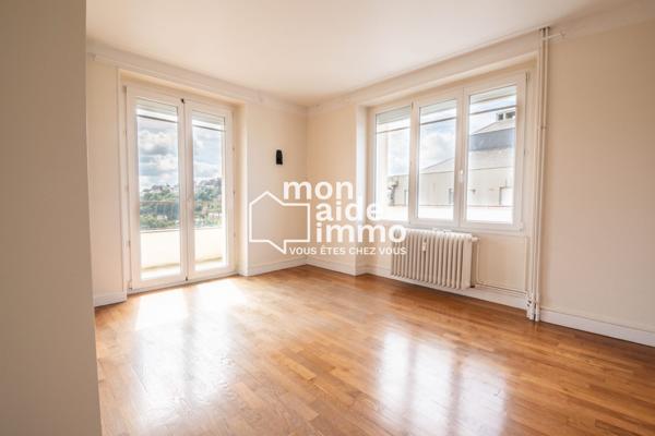 Appartement T3 avec balcons, cave et place de parking