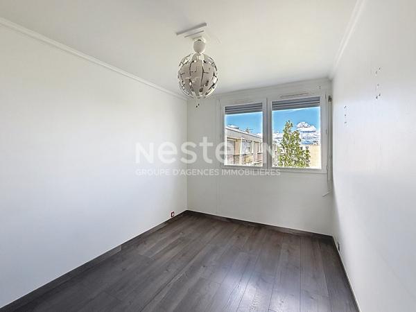 Appartement traversant moderne de 4 Pièces avec Cave et Parking en dernier étage - 69500 BRON