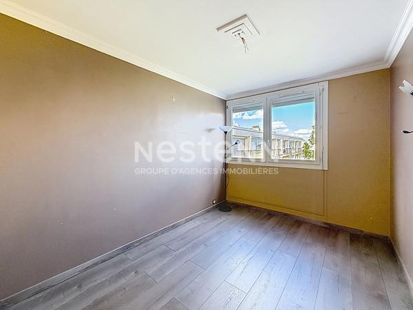 Appartement traversant moderne de 4 Pièces avec Cave et Parking en dernier étage - 69500 BRON