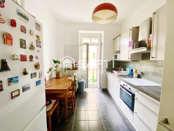 Appartement Hausmanien, lumineux, traversant, 2 balcons