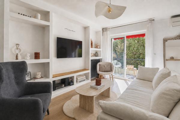 Appartement T3/4 rénové de 84.3 m2 avec cave et terrasse dans résidence sécurisée