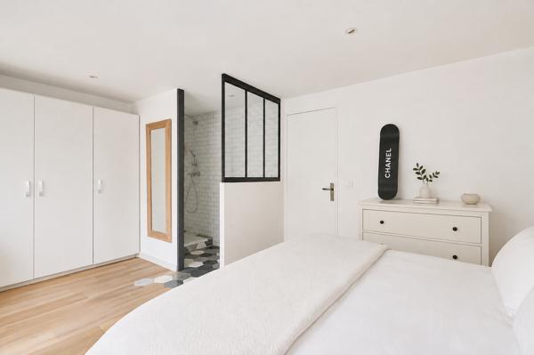Appartement T3/4 rénové de 84.3 m2 avec cave et terrasse dans résidence sécurisée