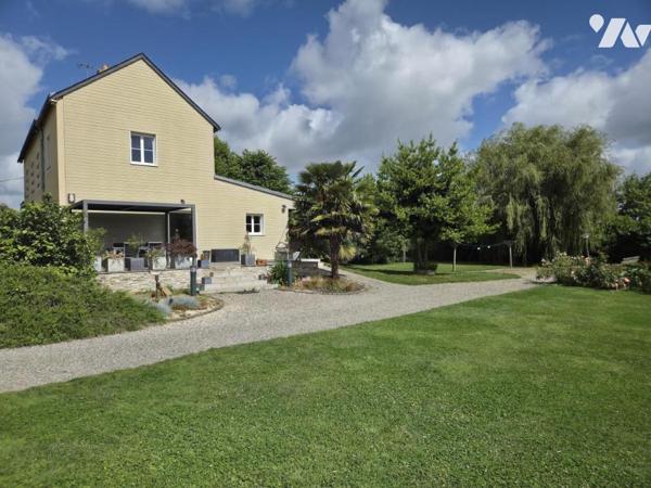 Château-Gontier - Maison 193m² habitables, terrain de 7655m² en partie boisé avec dépendance.