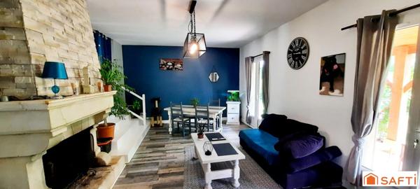 Maison avec grand terrain et véranda