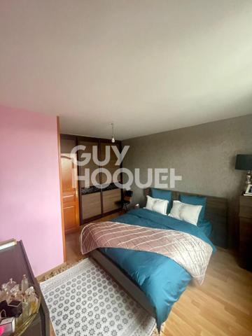 Maison familiale avec jardin et double garage - secteur calme et recherché