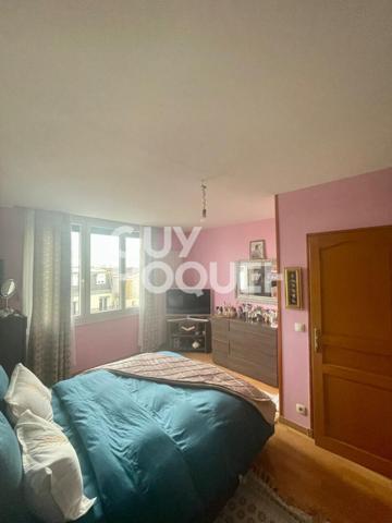 Maison familiale avec jardin et double garage - secteur calme et recherché