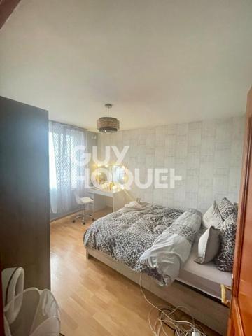 Maison familiale avec jardin et double garage - secteur calme et recherché