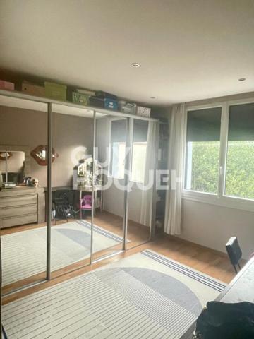 Maison familiale avec jardin et double garage - secteur calme et recherché