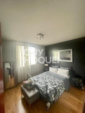 Maison familiale avec jardin et double garage - secteur calme et recherché