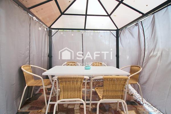 Appartement Duplex avec 3 chambres-mezzanine-caves-garage et jardin!