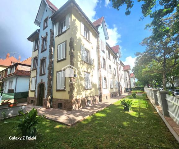Appartement de 56 m², comprenant des combles et une cave.