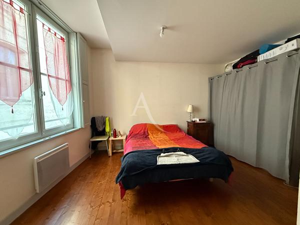 Duplex lumineux en plein coeur de ville avec parking sécurisé