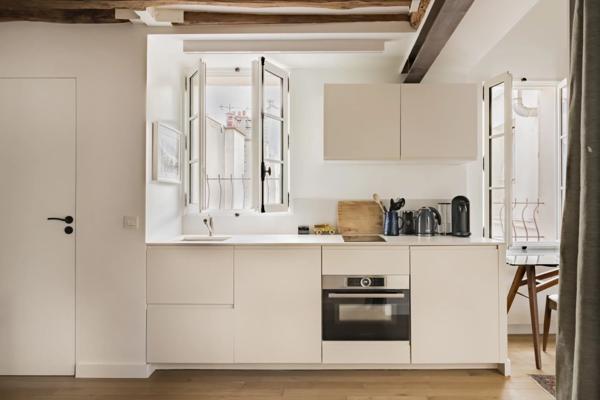 Appartement Paris 7 e - CARRÉ DES ANTIQUAIRES