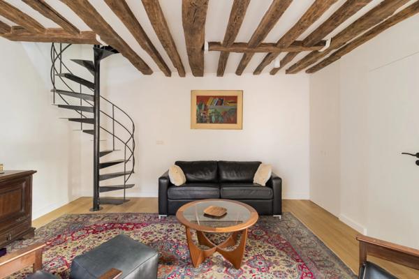 Appartement Paris 7 e - CARRÉ DES ANTIQUAIRES