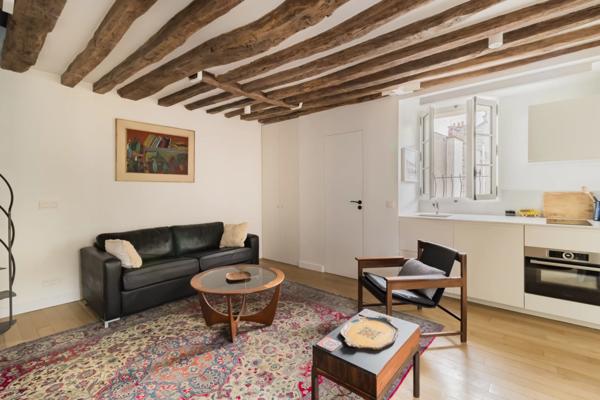 Appartement Paris 7 e - CARRÉ DES ANTIQUAIRES