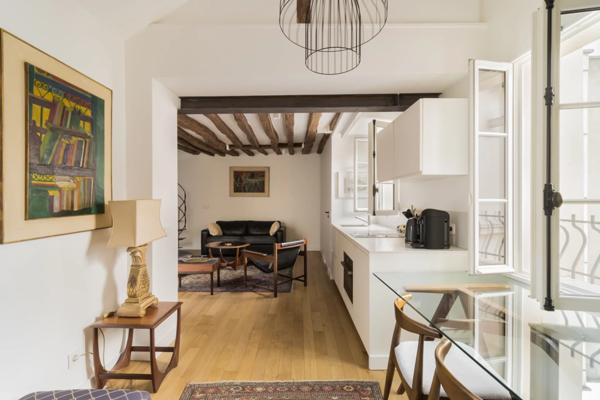 Appartement Paris 7 e - CARRÉ DES ANTIQUAIRES