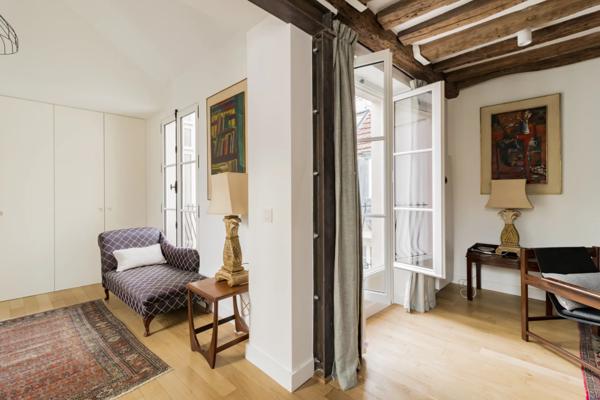 Appartement Paris 7 e - CARRÉ DES ANTIQUAIRES