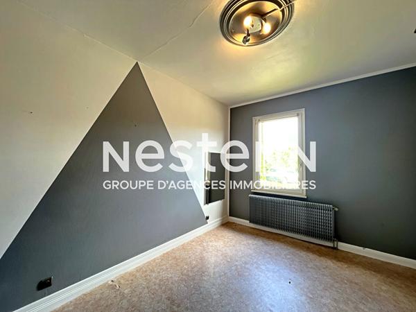 Maison spacieuse a renover avec jardin, proche ecoles et commodites, situe a Haguenau