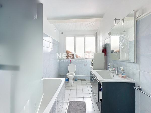 A vendre un Immeuble de rapport à Auch 200 m2 avec Local Commercial et Appartement T2