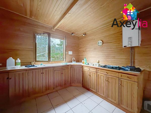 Villerest (42300) A VENDRE - VILLEREST PROCHE BARRAGE - TERRAIN VIABILISÉ DE 1609M2 EN PARTIE CONSTRUCTIBLE AVEC CHALET