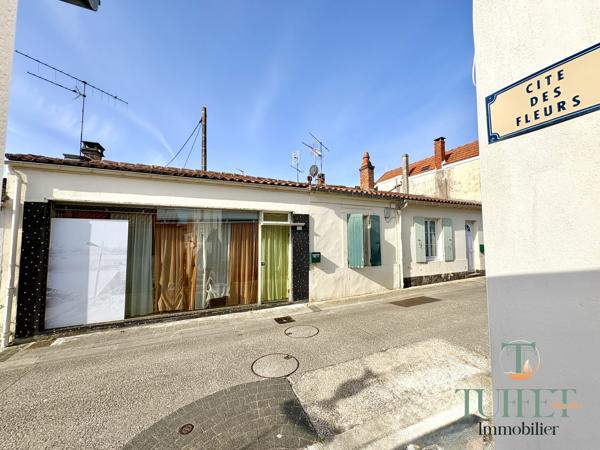 MAISON DE PLAIN-PIED EN CENTRE VILLE