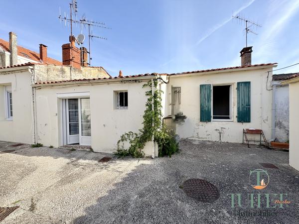 MAISON DE PLAIN-PIED EN CENTRE VILLE