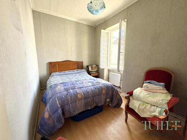 MAISON DE PLAIN-PIED EN CENTRE VILLE