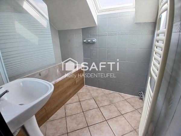 INDIVIDUELLE AVEC GARAGE ET PASSAGE SUR LE COTE - 3 CHAMBRES