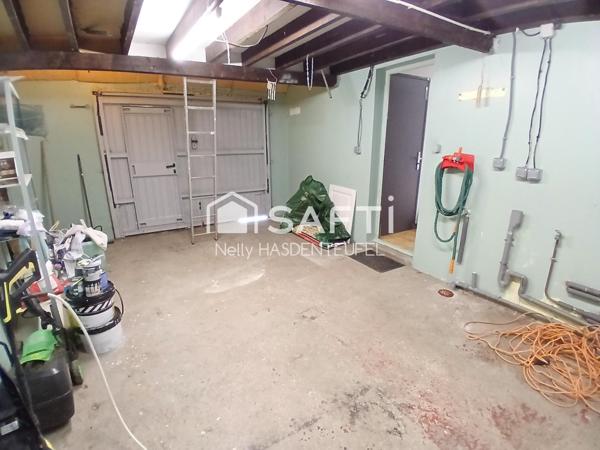 INDIVIDUELLE AVEC GARAGE ET PASSAGE SUR LE COTE - 3 CHAMBRES