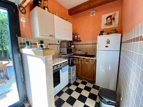 À vendre – Propriété avec vue panoramique et dépendance en pierre, à 5 min d’Uzès