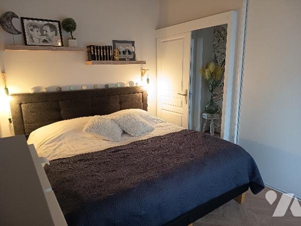 Appartement T3 de 103 m² rénové en 2003 dans un immeuble Haussmannien , avec parking et cave.