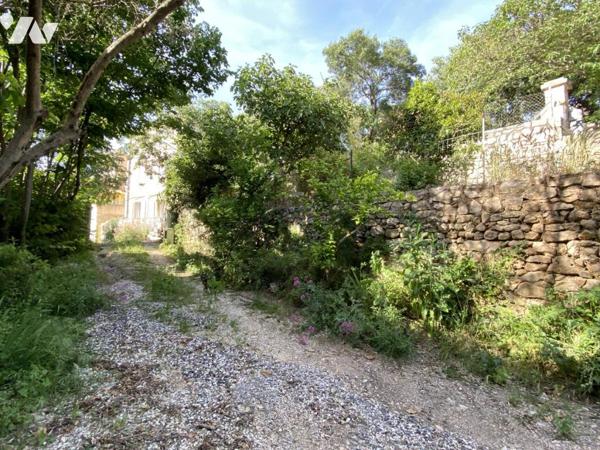  ENTRE  UZES  et ALES - MAS EN PIERRES APPRENTES A RENOVER  AVEC TERRAIN ET VUE DEGAGEE