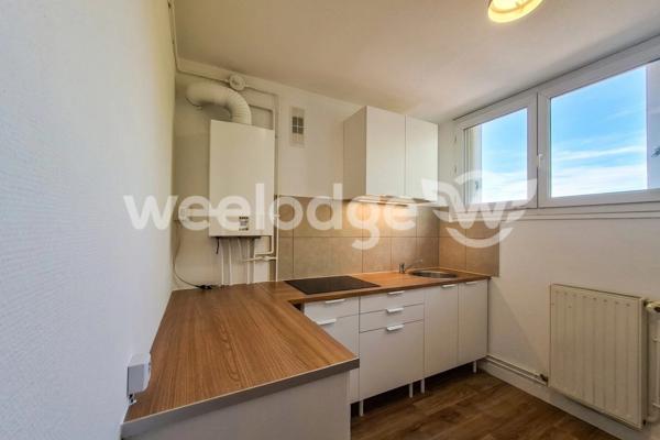 Appartement à louer 3 pièces de 52,3 m² à Sainte-Geneviève-des-Bois