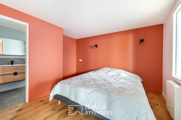 Maison rénovée avec terrasse et stationnements