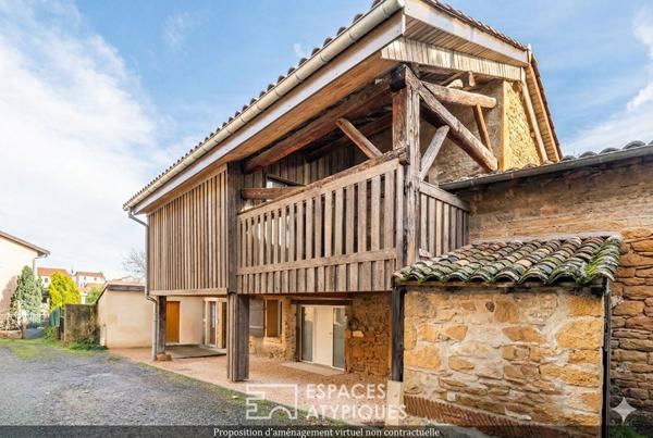 Maison rénovée avec terrasse et stationnements