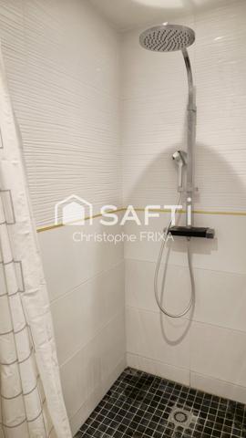 Maison mitoyenne entièrement rénovée avec garage et jardin, idéale famille