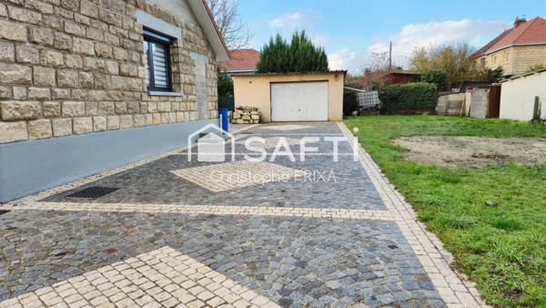 Maison mitoyenne entièrement rénovée avec garage et jardin, idéale famille
