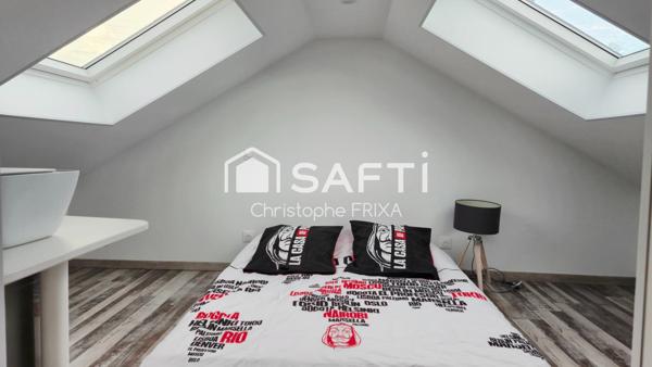 Maison mitoyenne entièrement rénovée avec garage et jardin, idéale famille