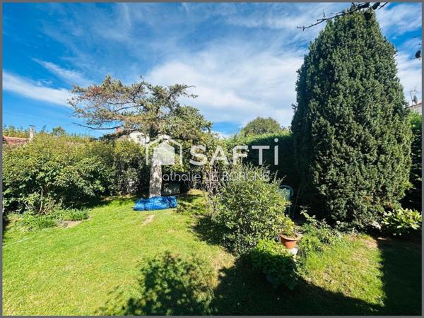 Joli pavillon avec garage et jardin