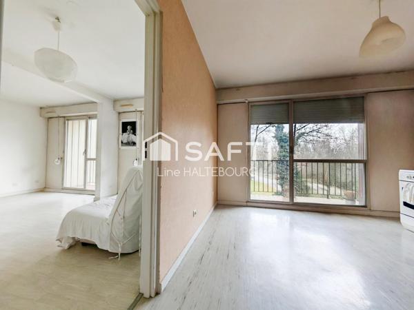 Appartement de 92m² avec 3 chambres - balcon, parking et cave
