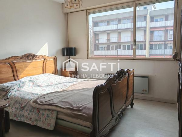 Appartement de 92m² avec 3 chambres - balcon, parking et cave