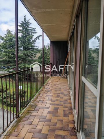 Appartement de 92m² avec 3 chambres - balcon, parking et cave