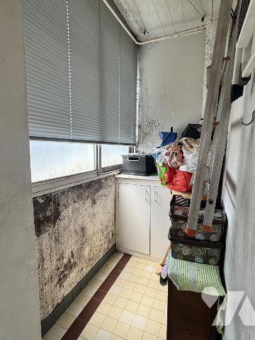 Grenoble appartement de 3P+C, en étage, ascenseur, balcon et garage individuel, cave