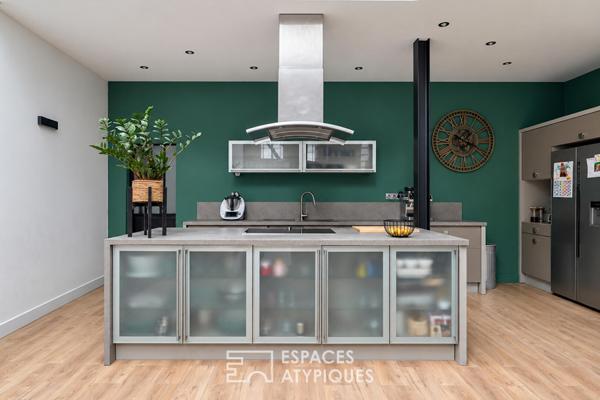 Loft d’exception aux volumes spectaculaires dans un ancien cinéma