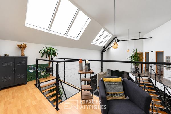 Loft d’exception aux volumes spectaculaires dans un ancien cinéma