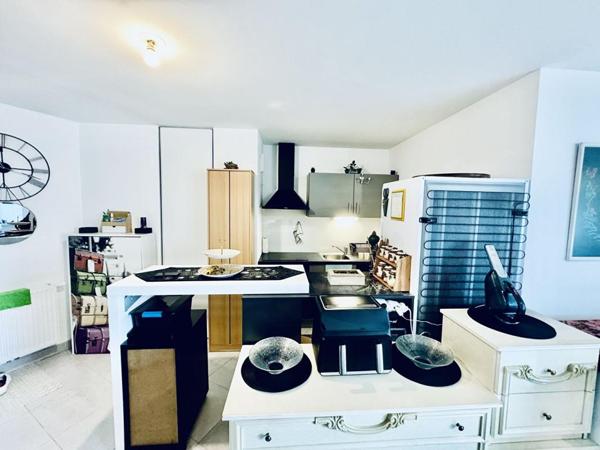 T2 49 m² + terrasse 20 m² + parking