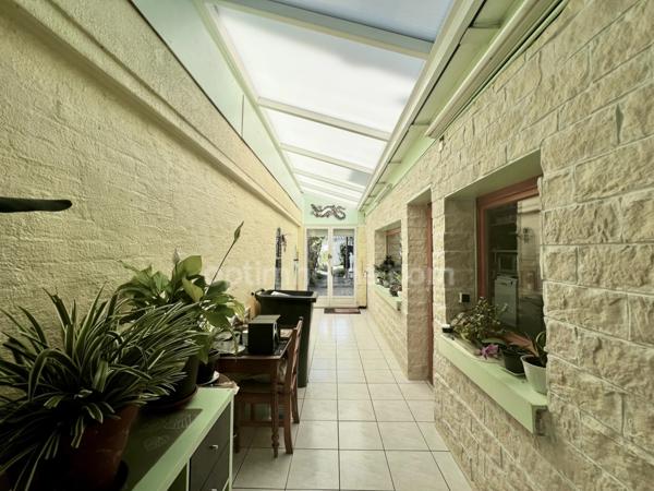 Maison de 124 m² habitables avec garage et jardin